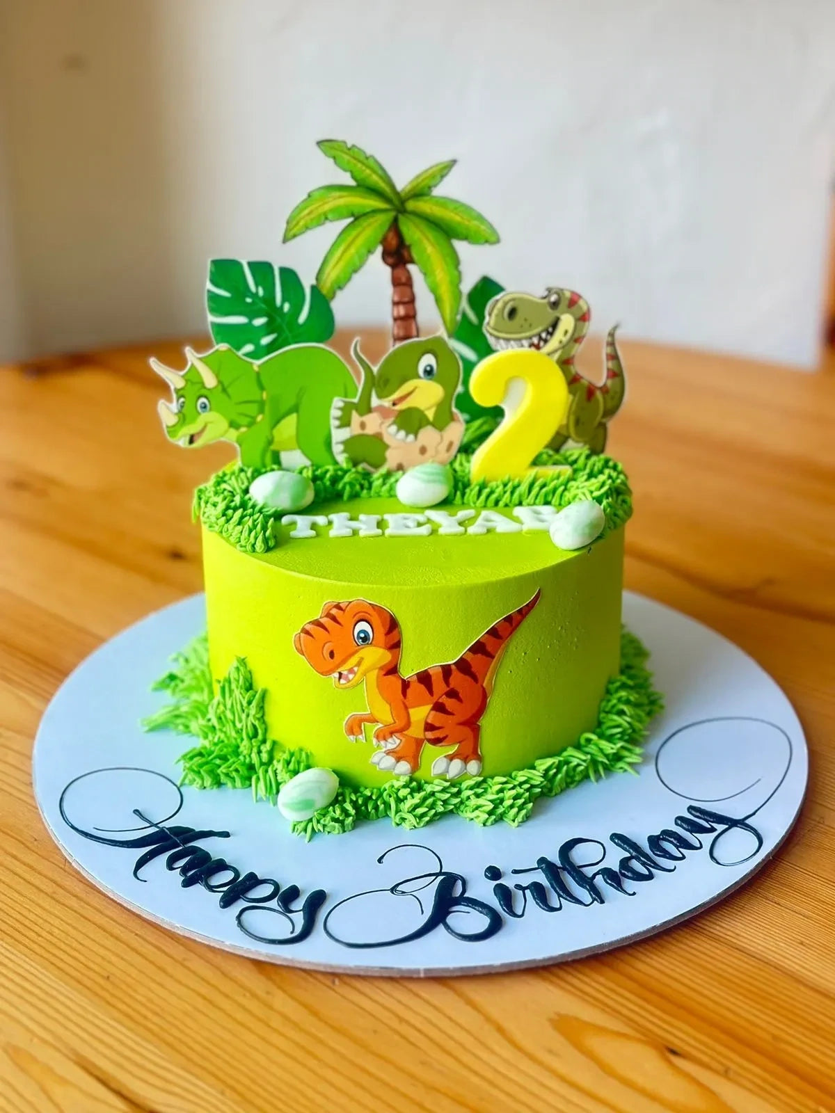 Dinosaur prints Cake in Green Buttercream